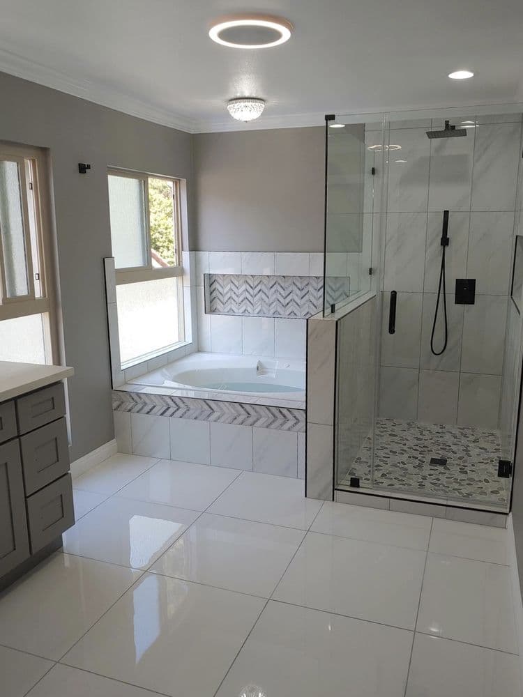 Finished bathroom renovation by SummitForge Construction